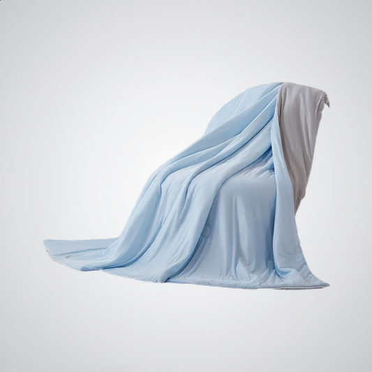 ThermoSoie™ – La Couverture Rafraîchissante Chaud/Froid